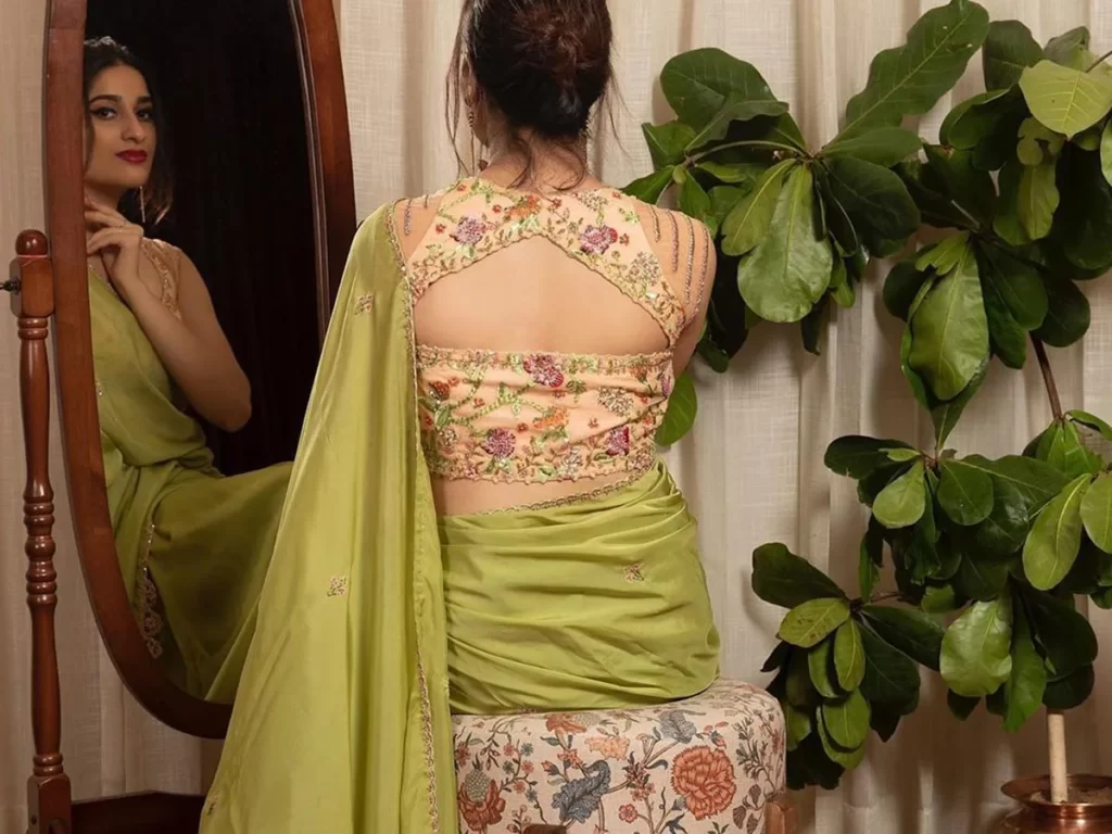 Backless with embellished detailing Blouse Designs for Banarasi Sarees